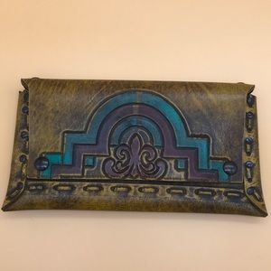 Hand tooled leather clutch